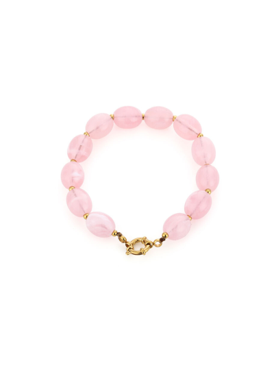 Kralenarmband met natuursteenlook en gouden details