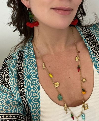 Lange ketting met diverse bedels