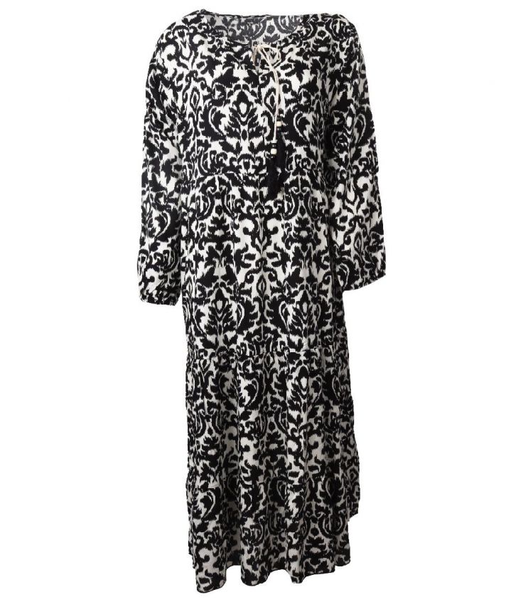 Lange jurk met zwarte ornament print en kwastjes