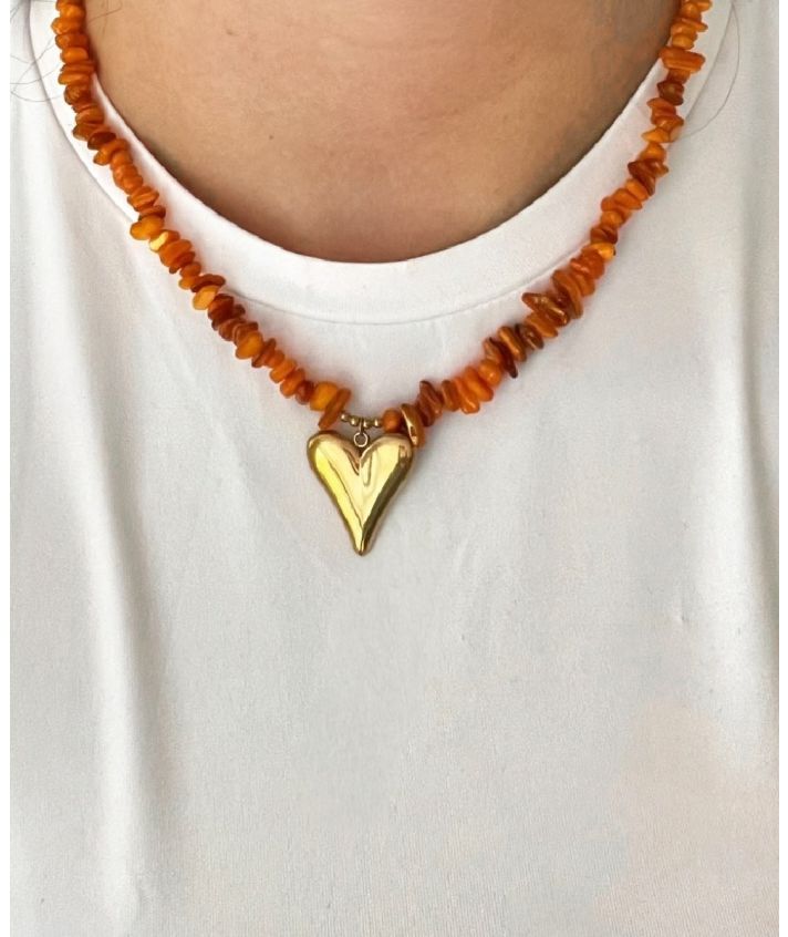 Oranje kralenketting in met hart hanger