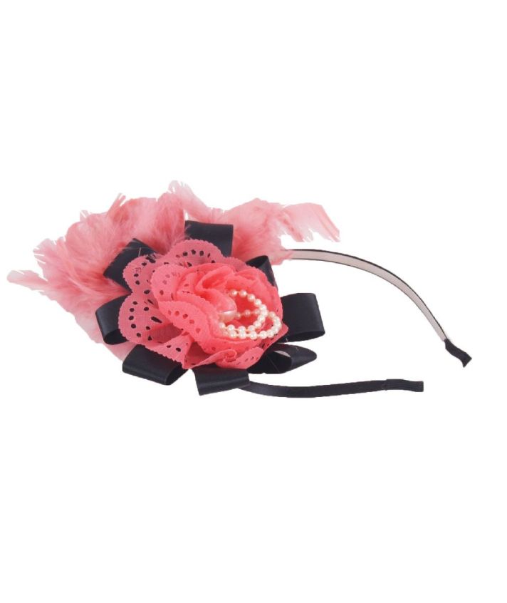 Koraal roze haaraccessoire met zwarte lintbogen