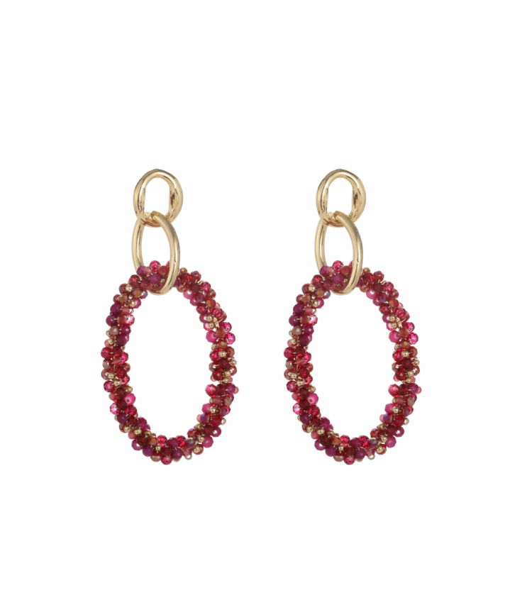 Statement oorbellen met roze kraaltjes